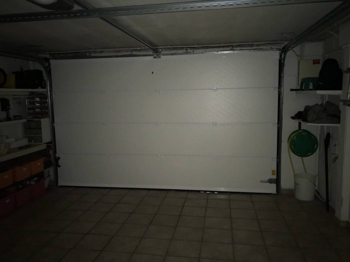 Porte de garage sectionnelle ouverture plafond